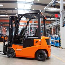 new-forklift-is-standing-on-modern-warehouse-2022-11-12-02-53-21-utc